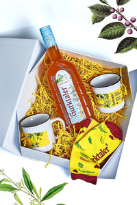 Gurktaler Geschenkset Sanddorn Punsch: 1x Gurktaler Alpen-Aperitif 0,7l 16% vol, 1x Gurktaler Happy Socks in Größe 37-41